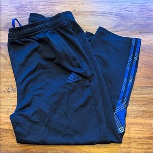 Adidas Tiro cropped Black Joggers with Blue Stripes